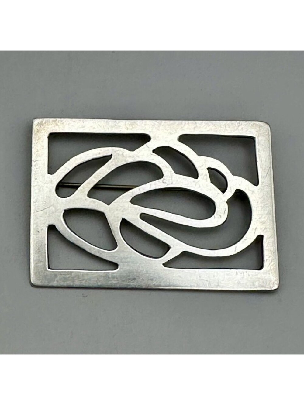 Modernist Cut Out Scrolls Brooch Signed John Bryan Sterling Silver Hand Wrought